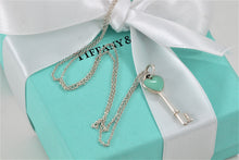 Load image into Gallery viewer, Tiffany &amp; Co. Silver Blue Enamel Small Heart Key Charm Pendant Necklace
