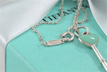 Load image into Gallery viewer, Tiffany &amp; Co. Silver Blue Enamel Small Heart Key Charm Pendant Necklace
