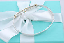 Load image into Gallery viewer, Tiffany &amp; Co. 18K Gold &amp; Silver Double Circle Hook Bangle Bracelet
