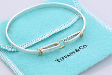Load image into Gallery viewer, Tiffany &amp; Co. 18K Gold &amp; Silver Double Circle Hook Bangle Bracelet
