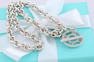 Tiffany & Co. Atlas Silver Roman Numerals Medallion Toggle Necklace