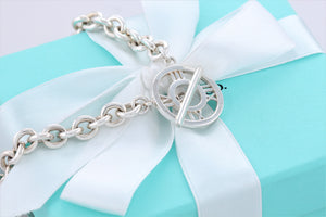 Tiffany & Co. Atlas Silver Roman Numerals Medallion Toggle Necklace