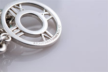 Load image into Gallery viewer, Tiffany &amp; Co. Atlas Silver Roman Numerals Medallion Toggle Necklace
