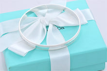 Load image into Gallery viewer, Tiffany &amp; Co. Silver Yours &#39;&#39;Tiffany &amp; Co.&#39;&#39; Beaded Edge Bangle Bracelet
