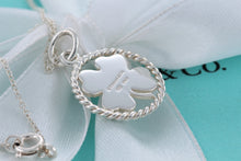 Load image into Gallery viewer, Tiffany &amp; Co. Silver Twist Clover Charm Pendant Necklace
