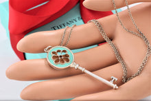 Load image into Gallery viewer, Tiffany &amp; Co. Silver Blue Enamel Large Knot Key Pendant Necklace
