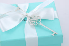 Load image into Gallery viewer, Tiffany &amp; Co. Silver Large Knot Key Pendant Necklace
