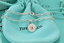 Load image into Gallery viewer, Tiffany &amp; Co. 18K Gold &amp; Silver Small Keyhole Circle Padlock Charm Bracelet
