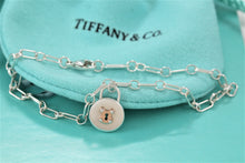 Load image into Gallery viewer, Tiffany &amp; Co. 18K Gold &amp; Silver Small Keyhole Circle Padlock Charm Bracelet
