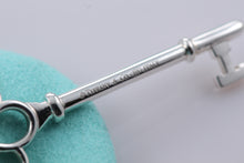 Load image into Gallery viewer, Tiffany &amp; Co. Silver Large Knot Key Pendant Necklace
