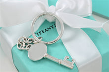 Load image into Gallery viewer, Tiffany &amp; Co. Silver Vintage Oval Key Pendant Keychain
