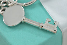 Load image into Gallery viewer, Tiffany &amp; Co. Silver Vintage Oval Key Pendant Keychain
