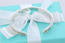 Load image into Gallery viewer, Tiffany &amp; Co. Atlas Silver Roman Numeral Narrow Cuff Bracelet
