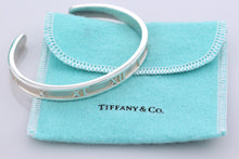 Load image into Gallery viewer, Tiffany &amp; Co. Atlas Silver Roman Numeral Narrow Cuff Bracelet
