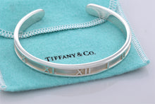 Load image into Gallery viewer, Tiffany &amp; Co. Atlas Silver Roman Numeral Narrow Cuff Bracelet
