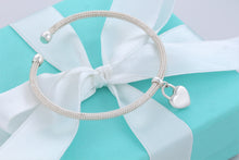 Load image into Gallery viewer, Return To Tiffany &amp; Co. Silver Dangling Heart Charm Mesh Cuff Bracelet
