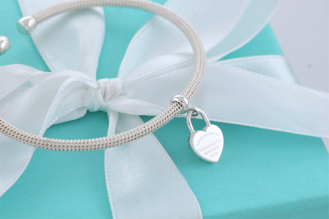 Return To Tiffany & Co. Silver Dangling Heart Charm Mesh Cuff Bracelet