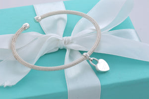 Return To Tiffany & Co. Silver Dangling Heart Charm Mesh Cuff Bracelet