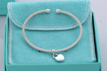 Load image into Gallery viewer, Return To Tiffany &amp; Co. Silver Dangling Heart Charm Mesh Cuff Bracelet
