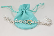 Load image into Gallery viewer, Tiffany &amp; Co. 18K Gold &amp; Silver Heart Link Toggle Closure Bracelet
