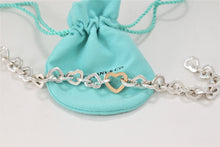 Load image into Gallery viewer, Tiffany &amp; Co. 18K Gold &amp; Silver Heart Link Toggle Closure Bracelet
