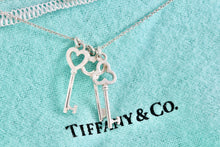 Load image into Gallery viewer, Tiffany &amp; Co. Silver Mini Oval, Heart &amp; Trefoil Triple Key Pendant 20&quot; Necklace

