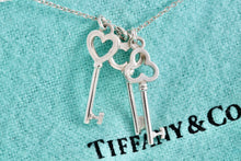 Load image into Gallery viewer, Tiffany &amp; Co. Silver Mini Oval, Heart &amp; Trefoil Triple Key Pendant 20&quot; Necklace
