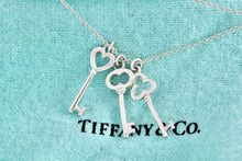 Load image into Gallery viewer, Tiffany &amp; Co. Silver Mini Oval, Heart &amp; Trefoil Triple Key Pendant 20&quot; Necklace
