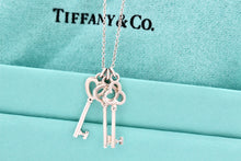 Load image into Gallery viewer, Tiffany &amp; Co. Silver Mini Oval, Heart &amp; Trefoil Triple Key Pendant 20&quot; Necklace
