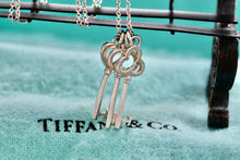 Load image into Gallery viewer, Tiffany &amp; Co. Silver Mini Oval, Heart &amp; Trefoil Triple Key Pendant 20&quot; Necklace
