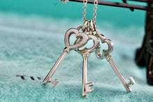 Load image into Gallery viewer, Tiffany &amp; Co. Silver Mini Oval, Heart &amp; Trefoil Triple Key Pendant 20&quot; Necklace
