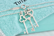 Load image into Gallery viewer, Tiffany &amp; Co. Silver Mini Oval, Heart &amp; Trefoil Triple Key Pendant 20&quot; Necklace
