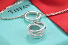 Load image into Gallery viewer, Tiffany &amp; Co. 1837 Silver Interlocking Circles Dangling Lariat Necklace
