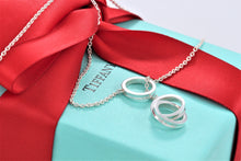 Load image into Gallery viewer, Tiffany &amp; Co. 1837 Silver Interlocking Circles Dangling Lariat Necklace
