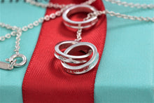 Load image into Gallery viewer, Tiffany &amp; Co. 1837 Silver Interlocking Circles Dangling Lariat Necklace

