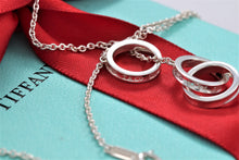 Load image into Gallery viewer, Tiffany &amp; Co. 1837 Silver Interlocking Circles Dangling Lariat Necklace

