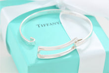 Load image into Gallery viewer, Tiffany &amp; Co. Silver Modern Rectangle Hook Bangle Bracelet
