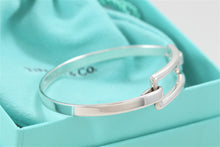 Load image into Gallery viewer, Tiffany &amp; Co. Silver Modern Rectangle Hook Bangle Bracelet
