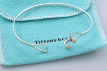 Load image into Gallery viewer, Tiffany &amp; Co. 14K Gold Trim &amp; Silver Double Heart Hook Bangle Bracelet
