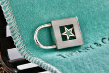 Load image into Gallery viewer, Tiffany &amp; Co. Silver Blue Enamel Star Padlock Pendant
