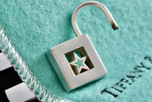 Load image into Gallery viewer, Tiffany &amp; Co. Silver Blue Enamel Star Padlock Pendant
