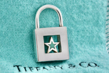 Load image into Gallery viewer, Tiffany &amp; Co. Silver Blue Enamel Star Padlock Pendant
