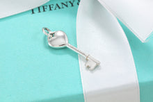 Load image into Gallery viewer, Tiffany &amp; Co. Silver Blue Enamel Small Heart Key Charm Pendant
