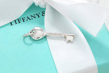 Load image into Gallery viewer, Tiffany &amp; Co. Silver Blue Enamel Small Heart Key Charm Pendant
