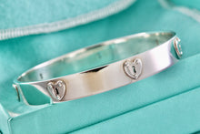 Load image into Gallery viewer, Tiffany &amp; Co. Silver Locks Heart Keyhole Bangle Bracelet
