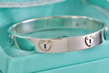 Load image into Gallery viewer, Tiffany &amp; Co. Silver Locks Heart Keyhole Bangle Bracelet
