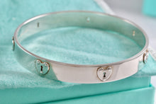 Load image into Gallery viewer, Tiffany &amp; Co. Silver Locks Heart Keyhole Bangle Bracelet
