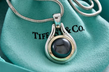 Load image into Gallery viewer, Tiffany &amp; Co. 18K Gold Hematite Round Pendant Snake Chain Necklace
