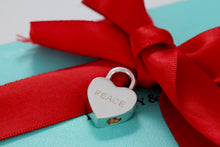 Load image into Gallery viewer, Tiffany &amp; Co. Silver &quot;Peace&quot; Heart Padlock Pendant
