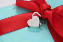 Load image into Gallery viewer, Tiffany &amp; Co. Silver &quot;Peace&quot; Heart Padlock Pendant
